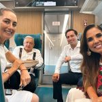 Claudia Sheinbaum, AMLO and Mara Lezama sit in a car of the Maya Train.